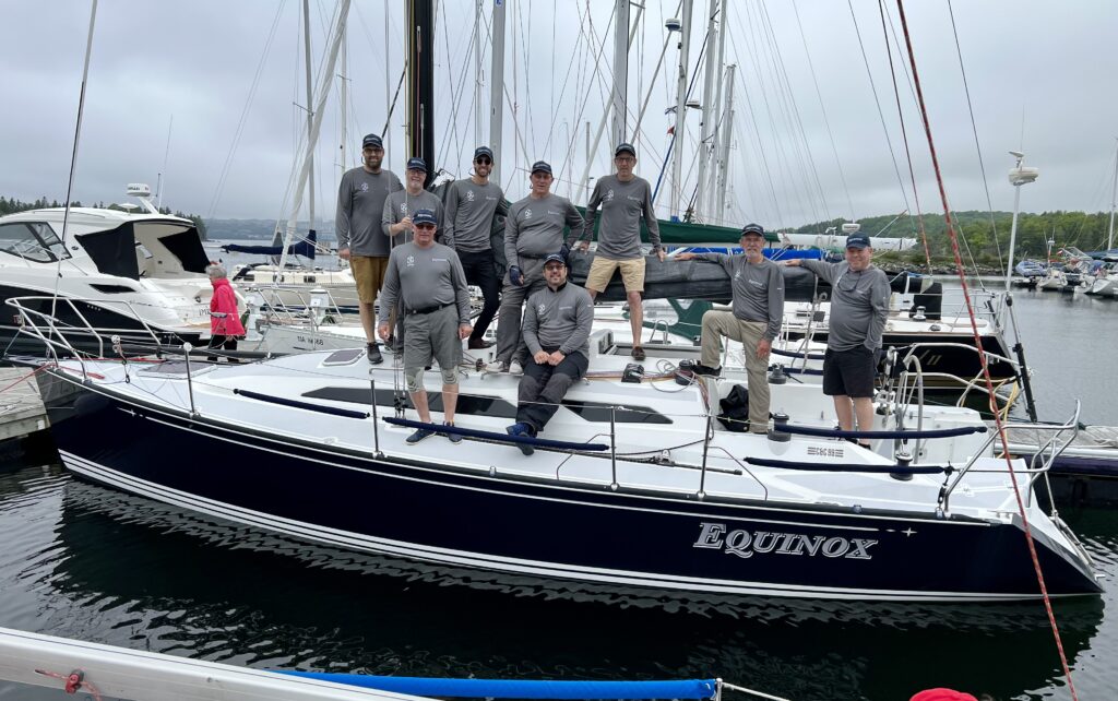 A crew of sailors boating in Nova Scotia.